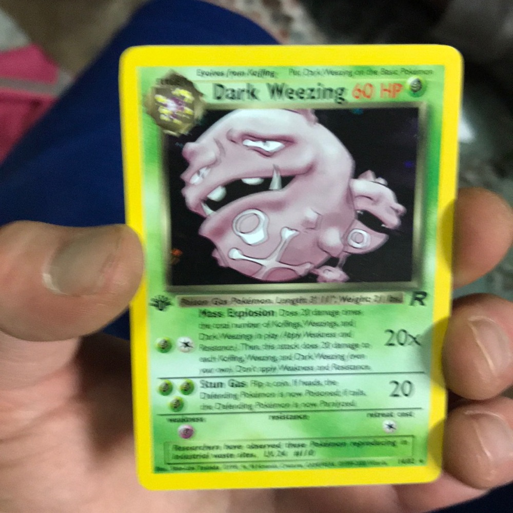 Holographic 1st edition dark Weezing Pokémon card